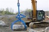 crane lifting boulder.jpg