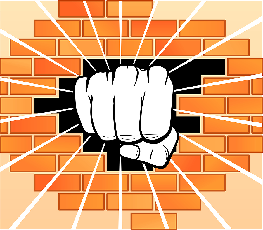bigstock_Fist_Breaking_Wall_2902094.jpg