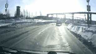 russia-dashboard-cam-tank-drives-across-road-snow-1359329911C-animated.gif