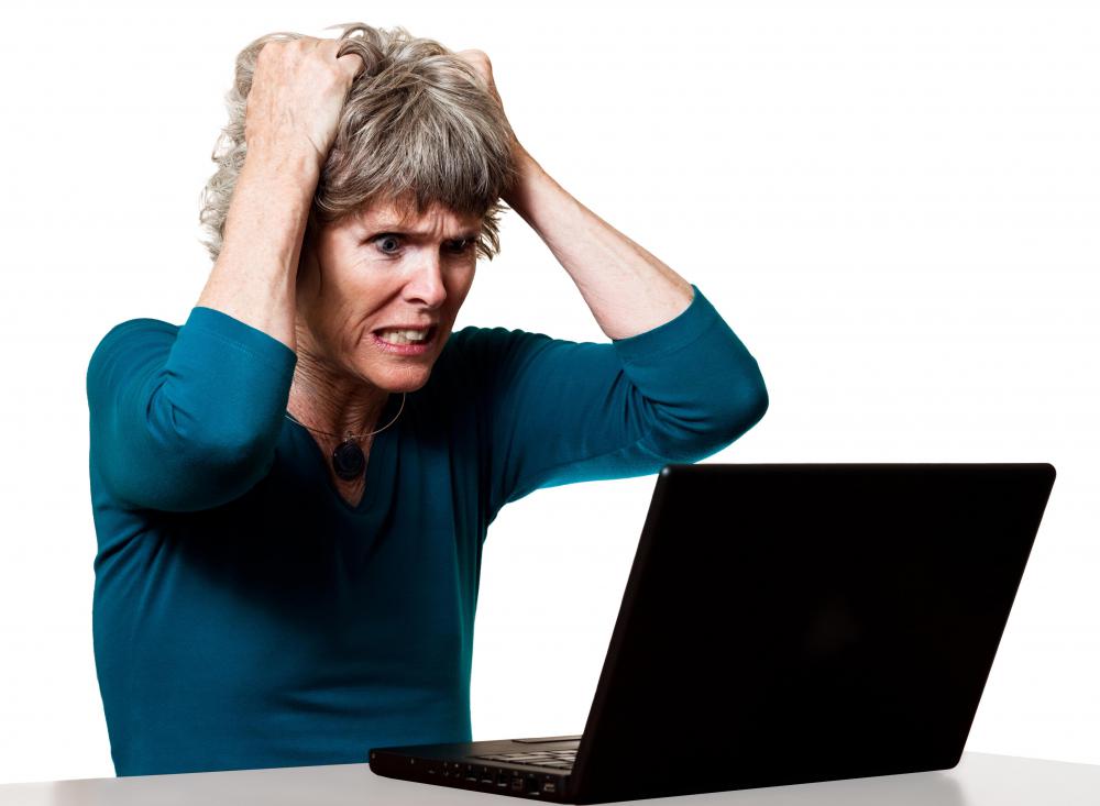 woman-with-hands-on-head-angry-at-computer.jpg