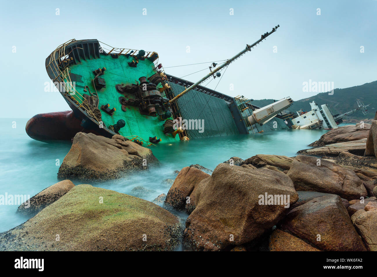 wrecked-ship-along-the-rocky-coast-WK6FA2.jpg