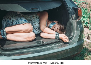 woman-tied-hands-inside-car-260nw-1787209418.jpg