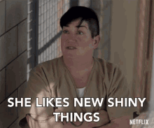 she-likes-new-shiny-things-interested.gif