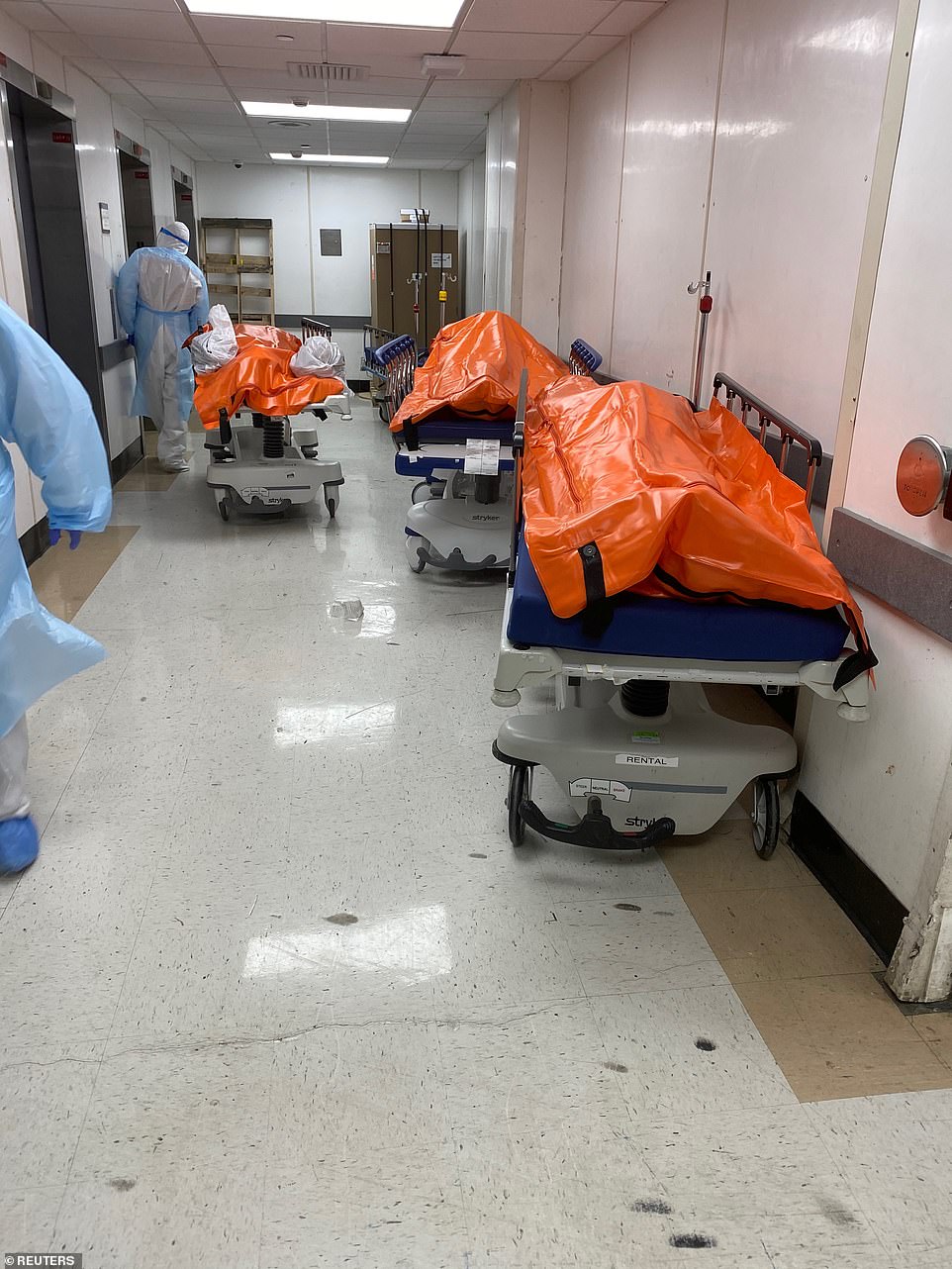26822954-8188533-Bodies_are_seen_lying_in_corridors_inside_the_Wyckoff_Hospital_a-a-63_1586064947454.jpg
