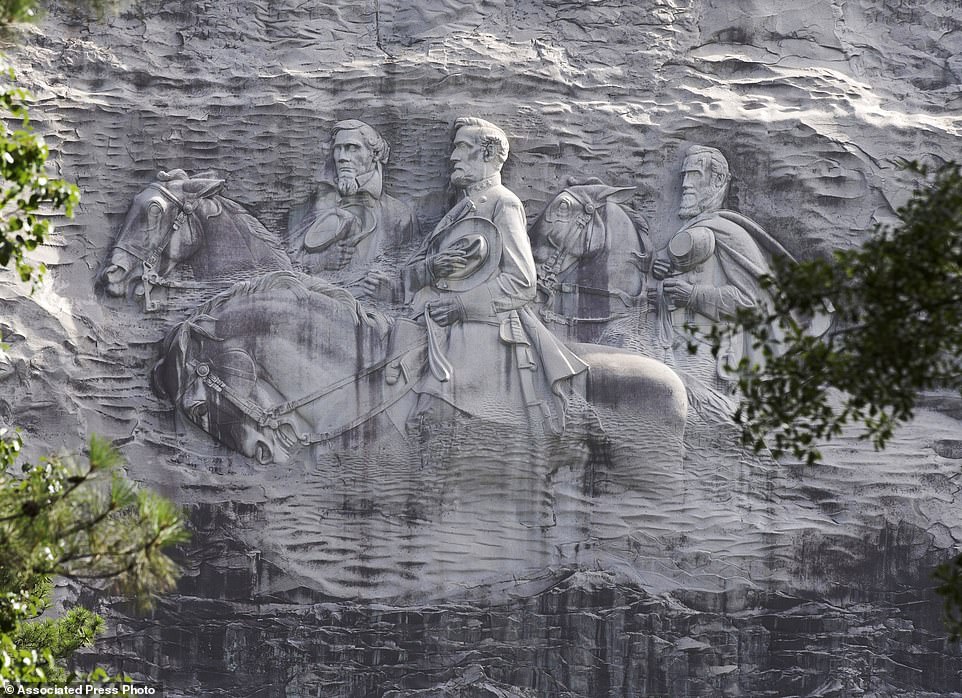 31967594-8631027-FILE_This_June_23_2015_file_photo_shows_a_carving_depicting_Conf-a-20_1597517019699.jpg