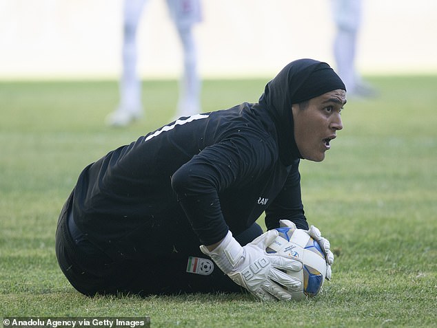 50558449-10208443-Iran_s_national_women_s_football_team_have_been_accused_by_Asian-m-13_1637083940134.jpg