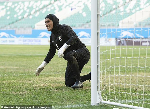 50559765-10208443-Koudaei_s_penalty_saves_earned_Iran_their_first_ever_appearance_-m-20_1637084032097.jpg