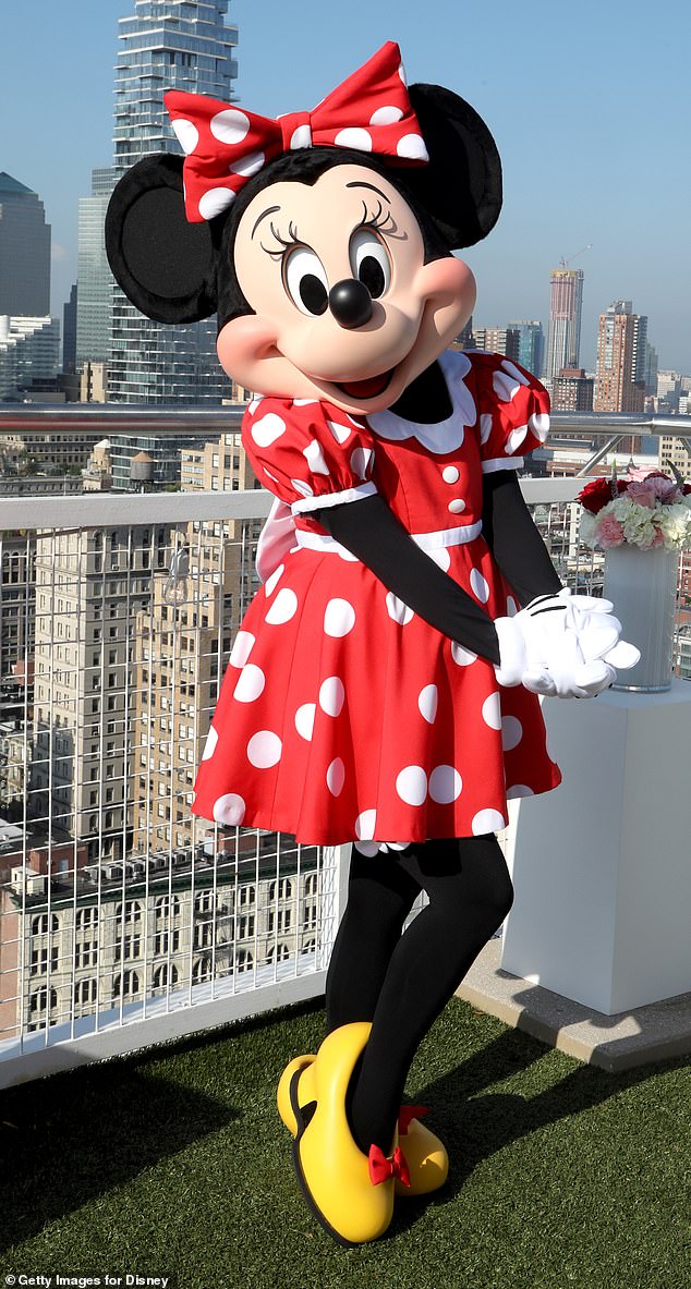 53453009-10449129-Minnie_who_was_created_almost_100_years_ago_in_1928_has_famously-a-64_1643310399876.jpg