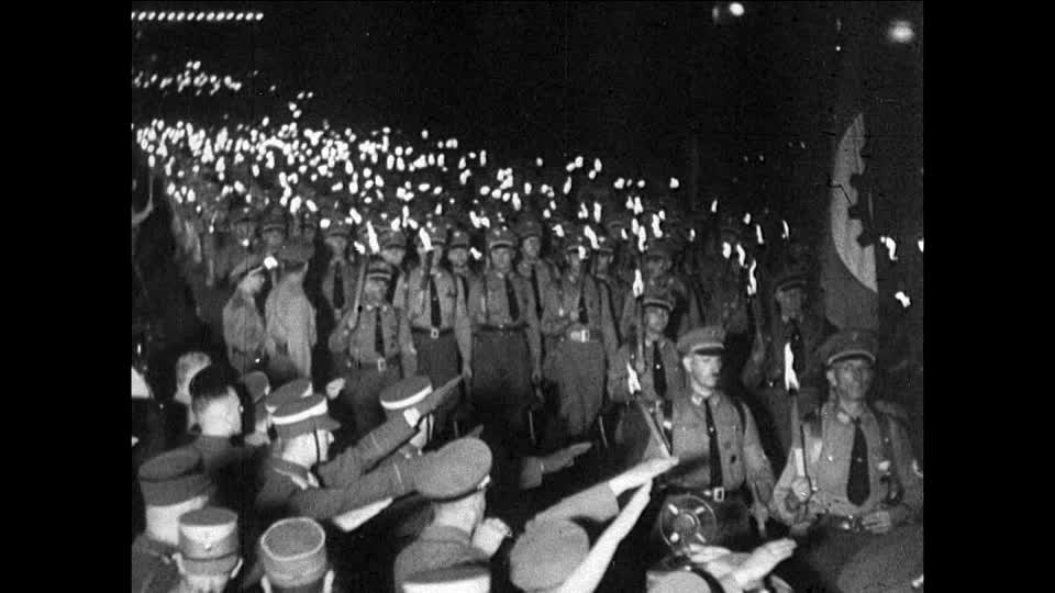 375965038-torchlight-procession-torch-fire-deployment-reichstag.jpg